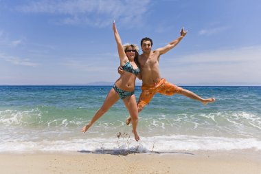 Kumsalda genç atlama