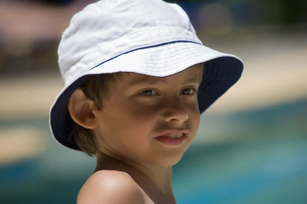 Portrait of the boy beside swimming pool — Stock Photo, Image