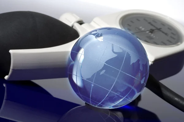 Glass globe with blood pressure — Stok fotoğraf