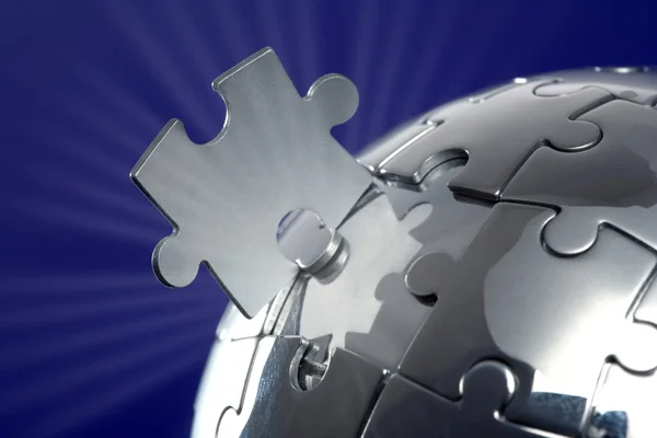 stock image Globe puzzle on blue background
