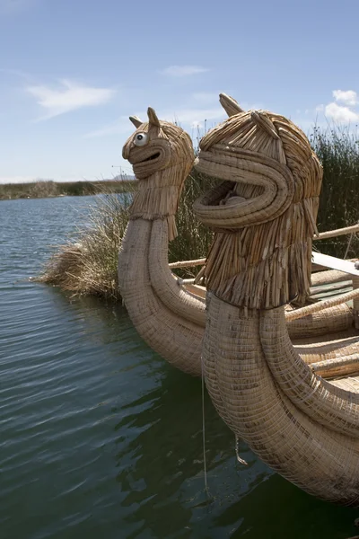 stock image Figures on the bows of the boats