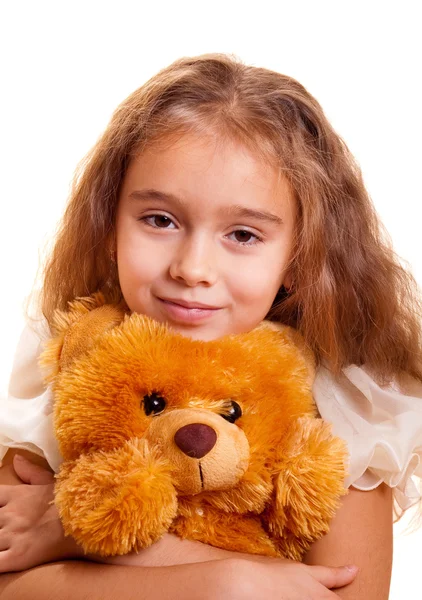 Маленька дівчинка і плюшевий ведмідь — стокове фото