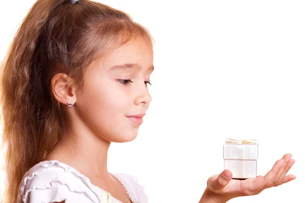 Little girl and gift — Stock Photo, Image