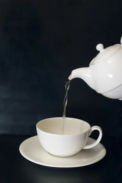 White china pot and a white china cup — Stock Photo, Image