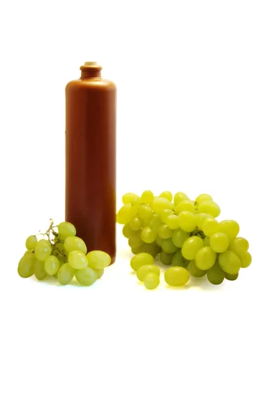 Grape and wine bottle — Stock Photo, Image