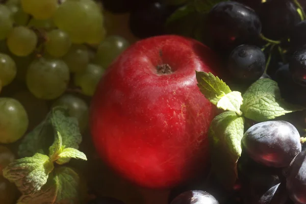 stock image Green and red grapes and apple