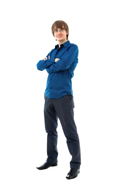 Молодой человек в рубашке и брюках — стоковое фото