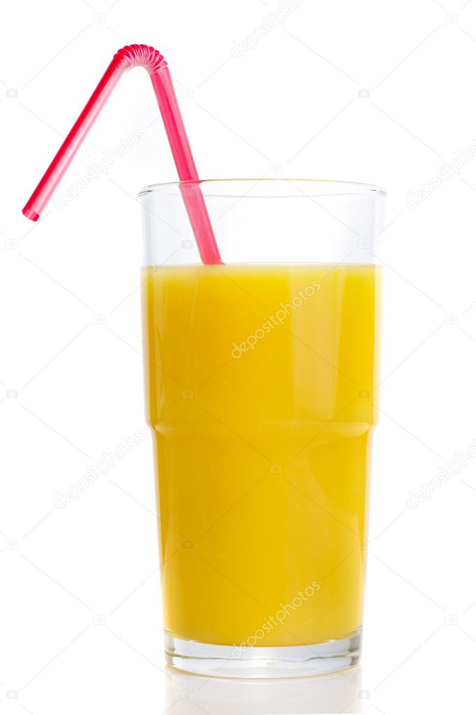 Glass of orange juice with tube