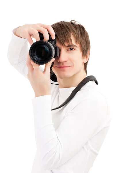 Photographer in white holding camera — Stock Photo, Image