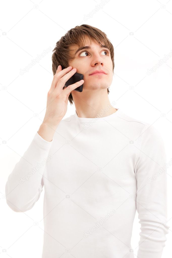 Young man talking by mobile phone