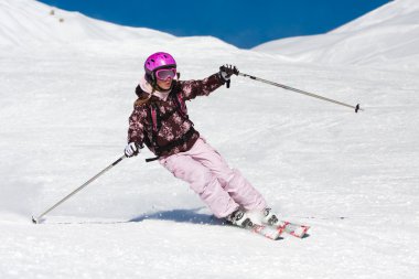 Young woman skiing clipart