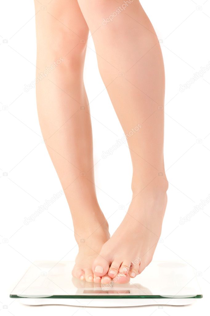 Woman feet on scale