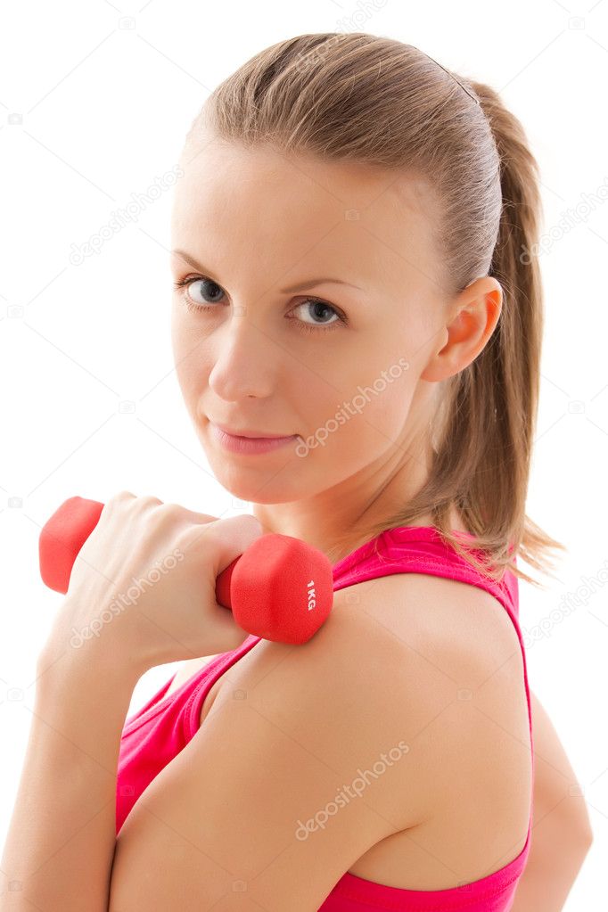Young fit girl with dumbbells