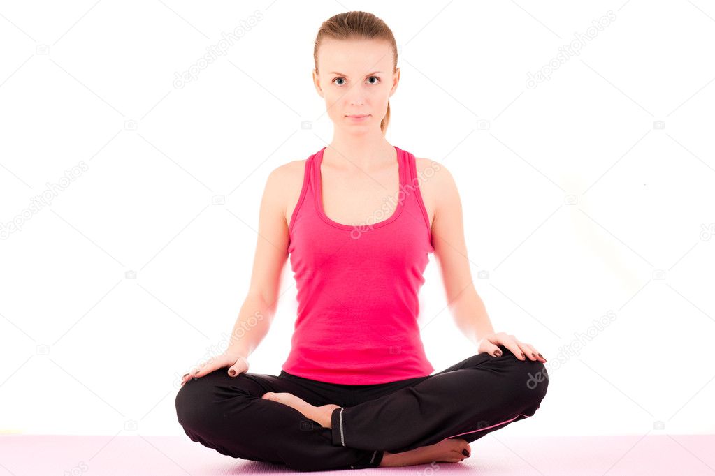 Young pretty woman doing yoga