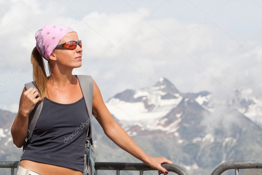 Young woman high in the mountains