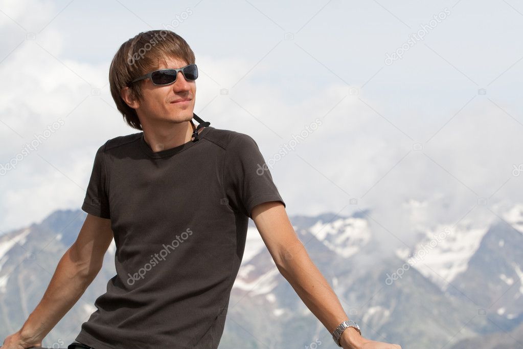 Young man enjoying the mountains