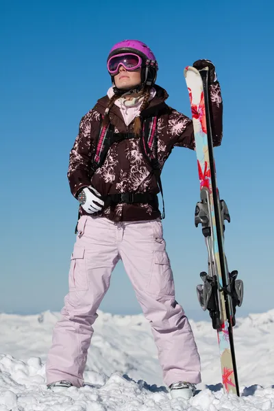 Girl skier with skis — Stock Photo, Image