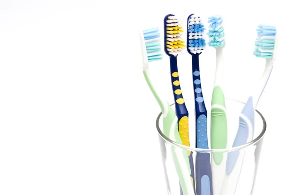 Tandenborstels en waterdruppel — Stockfoto