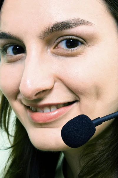 Gesicht einer lächelnden Frau mit Kopfhörern — Stockfoto