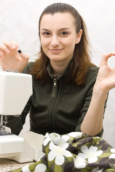 Hand sewing on a machine — Stock Photo, Image