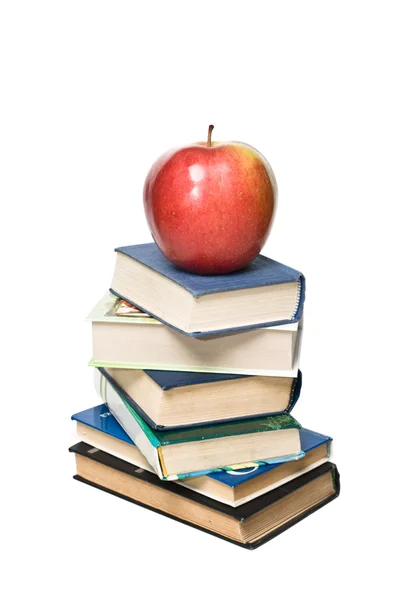 Stapel Bücher und roter Apfel — Stockfoto