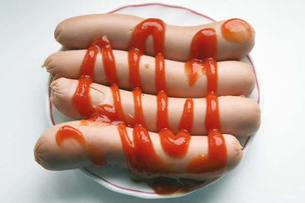 stock image Sausages with ketchup