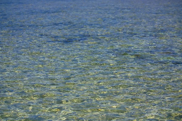 Фоновая поверхность моря — стоковое фото