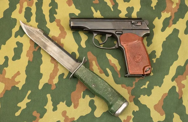 Army knife and handgun — Stock Photo, Image