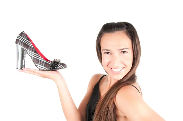 Vrouw met schoen — Stockfoto