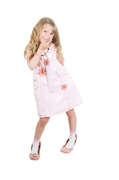 Little girl playing with big mom shoes — Stock Photo, Image