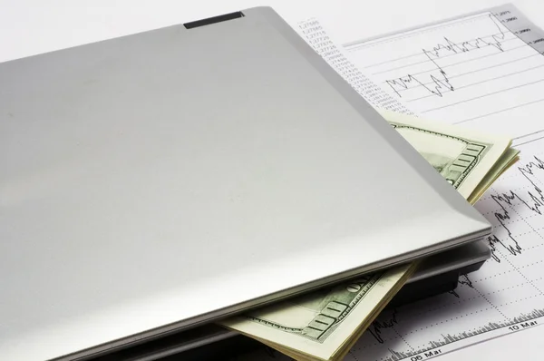 Notebook and dollars — Stock Photo, Image