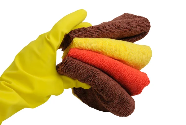 Stock image Rubber glove and stack of towels