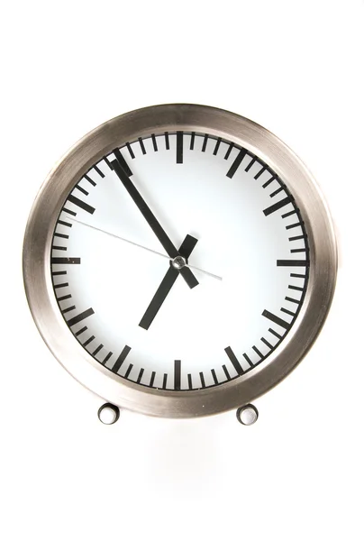 Relógio em um fundo branco — Fotografia de Stock