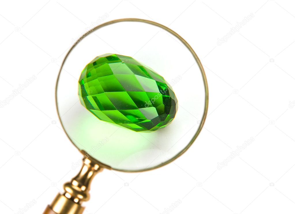 Glass egg under Magnifier. Isolated
