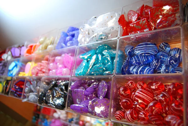 Multicoloured beads in bijouterie shop — Stock Photo, Image