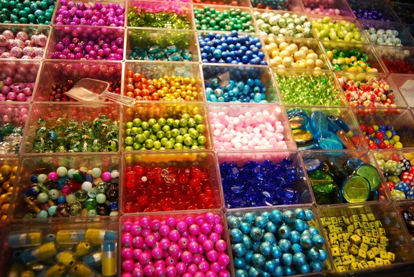 stock image Multicoloured beads in bijouterie shop