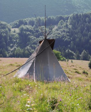 Teepee on the hill clipart