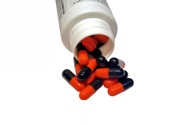 Pillole su uno sfondo bianco — Foto Stock