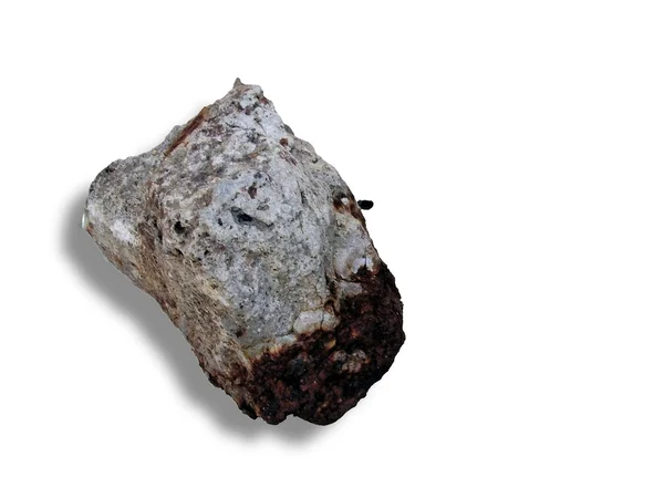 Meteorito sobre um fundo branco — Fotografia de Stock