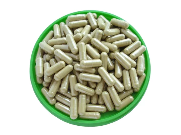 Pillole in un piatto — Foto Stock