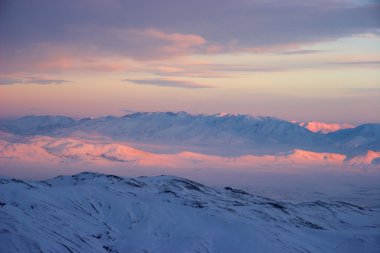 Winter alpenglow, view from Mount Erciyes, Turkey clipart