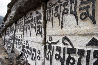 Buddhist mani prayer stones, Everest trail, Himalaya, Nepal clipart