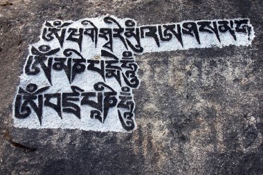 Buddhist mantra stone, Everest trek, Himalayas, Nepal clipart