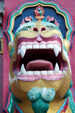 Buddhist lion guardian, Tengboche monastery, Everest trek, Nepal clipart