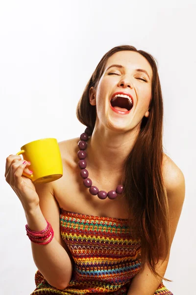 Beauty young woman with yellow cup — Stock Photo, Image