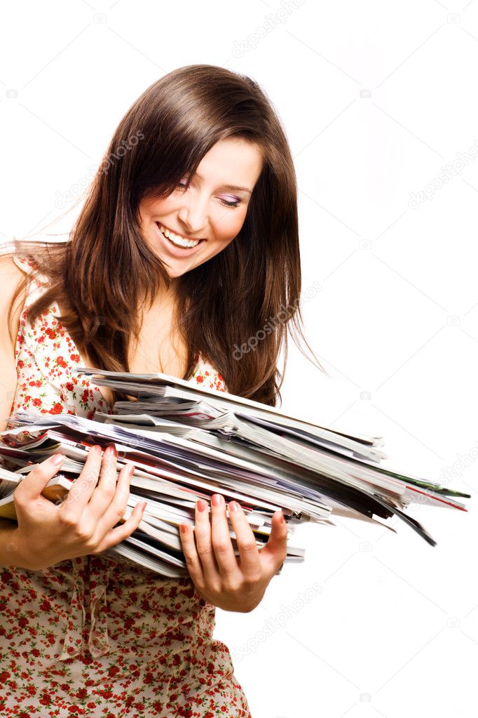 Beauty young woman with magazines