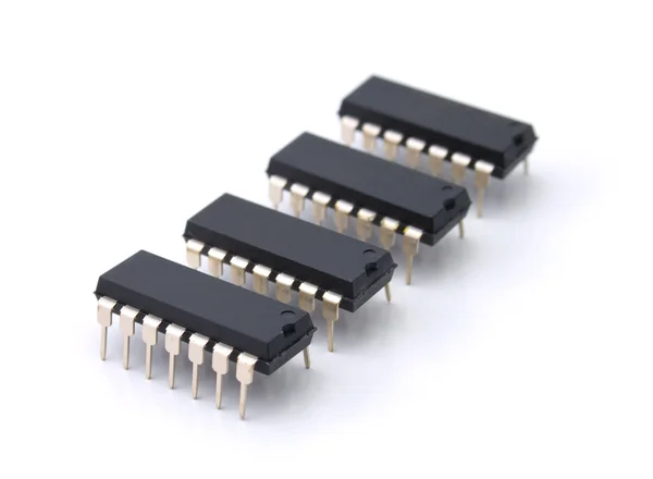 Quatro microcircuitos digitais — Fotografia de Stock