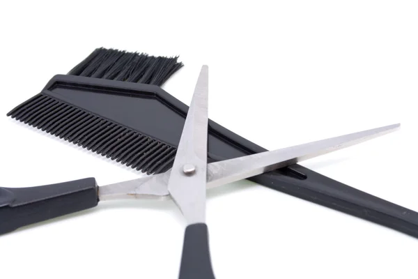Haarbürste und Schere aus Kunststoff — Stockfoto