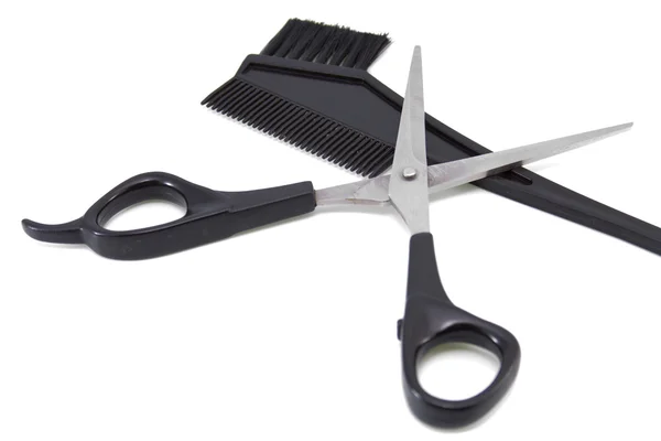 Haarbürste und Schere aus Kunststoff — Stockfoto