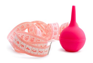 Pink measuring tape and enema, clipart
